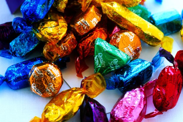 Urgent Quality Street recall - fears life-like Christmas baubles could be eaten