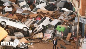 Watch: Drivers rescued after floodwaters cause chaos in Spain