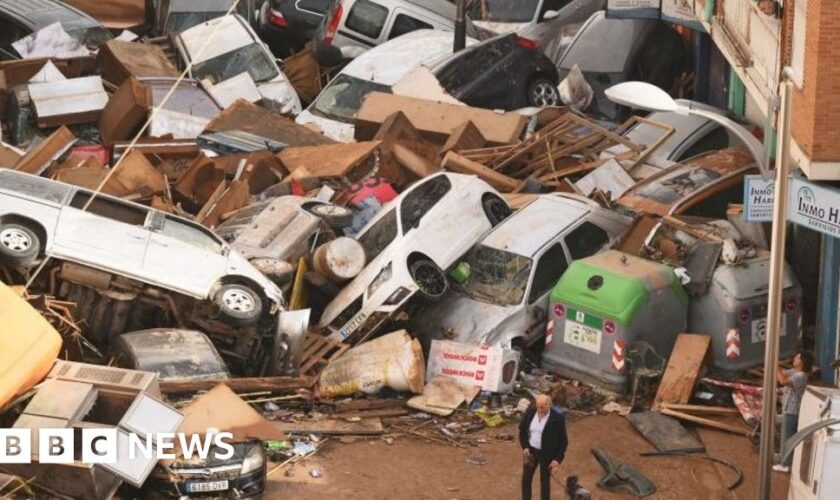 Watch: Drivers rescued after floodwaters cause chaos in Spain