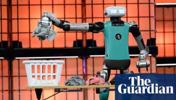 ‘A fork in the road’: laundry-sorting robot spurs AI hopes and fears at Europe’s biggest tech event