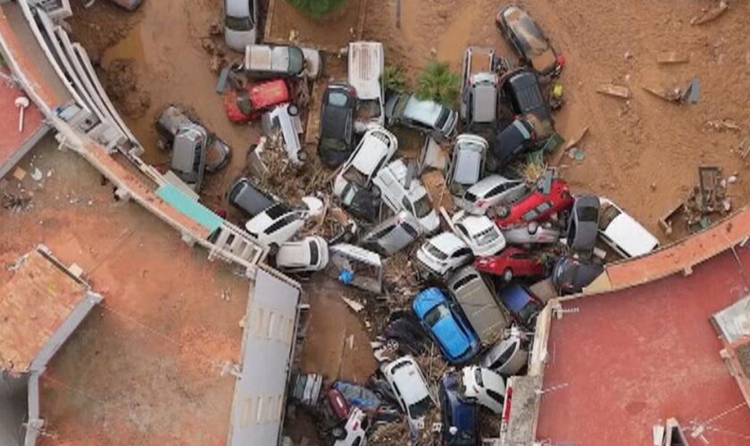 Wrecked cars in Alfafar, Spain, after the floods