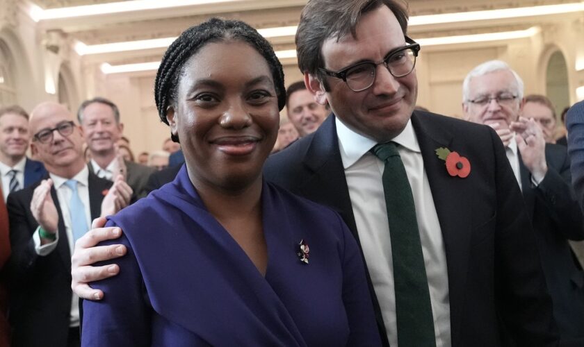 Kemi Badenoch and her husband Hamish. Pic: PA