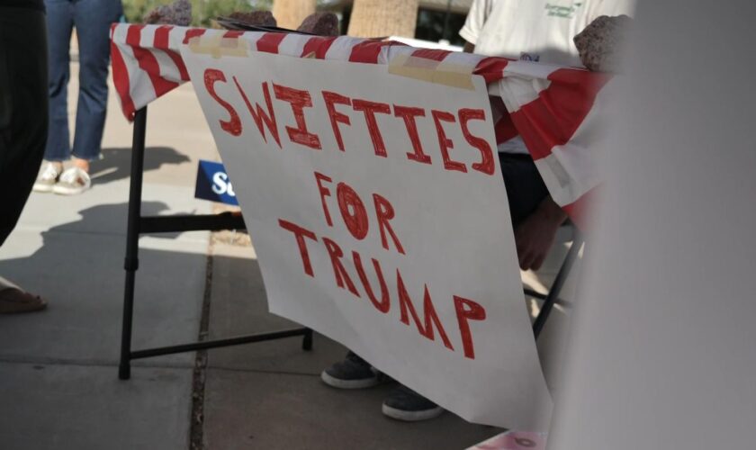 26-year-old mortgage broker Dane Jenson made a joke "Swifties for Trump" sign