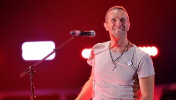 Coldplay’s Chris Martin falls through trap door on stage while performing in Melbourne