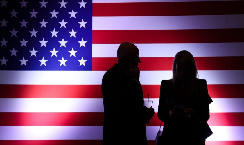 Voters watch results during an election night watch party for Sam Brown, Republican candidate for the U.S. Senate, Tuesday, Nov. 5, 2024, in Las Vegas, Nev. (AP Photo/Ian Maule)