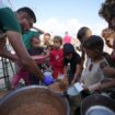 Hungry Palestinians in north Gaza search for food, sealed off from aid for a month by Israeli siege