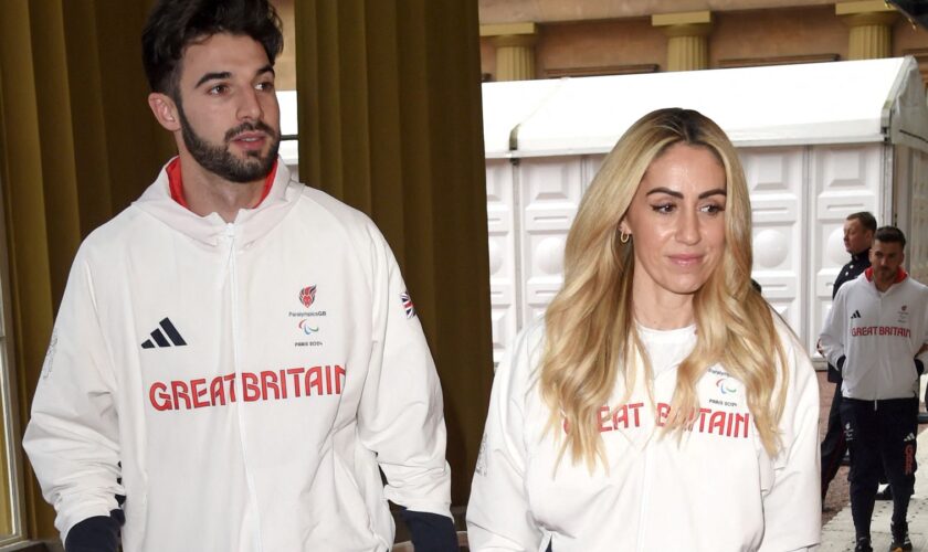 Zac Shaw and partner Ali Smith attend the Buckingham Palace event on Thursday. Pic: Reuters