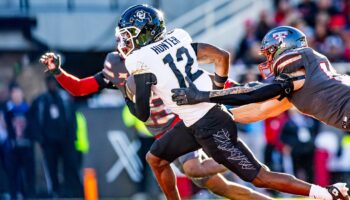 No. 20 Colorado stays alive for College Football Playoff as Heisman hopeful Travis Hunter continues dominance