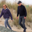 Biden appears to struggle while walking on beach with first lady