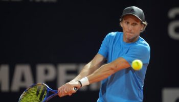 Diego Forlan’s pro tennis debut ends in defeat for former Uruguay forward