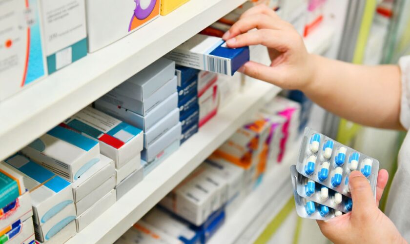 pharmacist holding antibiotics Pic: iStock