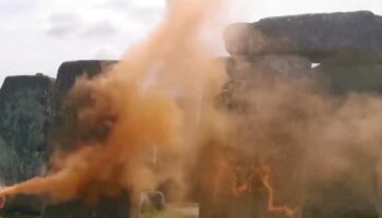 Two people charged by police after orange paint was thrown at Stonehenge in Just Stop Oil protest