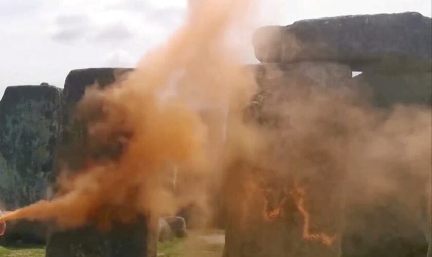 Two people charged by police after orange paint was thrown at Stonehenge in Just Stop Oil protest