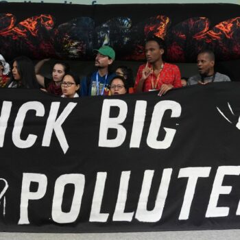 Activists participate in a demonstration against fossil fuels at the COP29 U.N. Climate Summit, Friday, Nov. 15, 2024, in Baku, Azerbaijan. (AP Photo/Joshua A. Bickel)