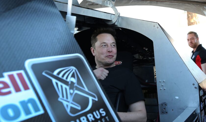 Ellon Musk, founder and CEO of SpaceX sits in a pod displayed in a booth during the SpaceX Hyperloop Pod Competition in Hawthorne, Los Angeles, California, U.S., January 29, 2017. REUTERS/Monica Almeida - RTSY00M