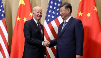 In a meeting with Biden, China's Xi cautions US to 'make the wise choice' to keep relations stable