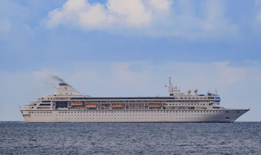 Villa Vie Odyssey cruise ship leaving Belfast Lough after being anchored off the coast on Bangor, Northern Ireland. The luxury cruise ship became marooned in Belfast for four months due to unexpected repair works and has finally got underway. Picture date: Thursday October 03, 2024.