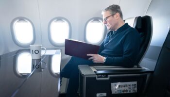 Keir Starmer on the plane to the G20 summit. Pic: PA