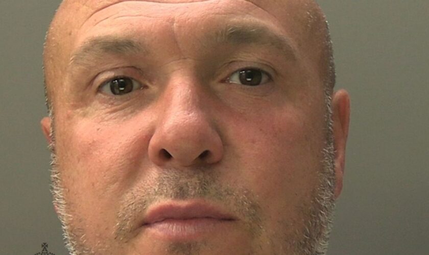 Daffron Williams, 41, has been jailed for distributing written material intended to stir up racial hatred. Pic: South Wales Police