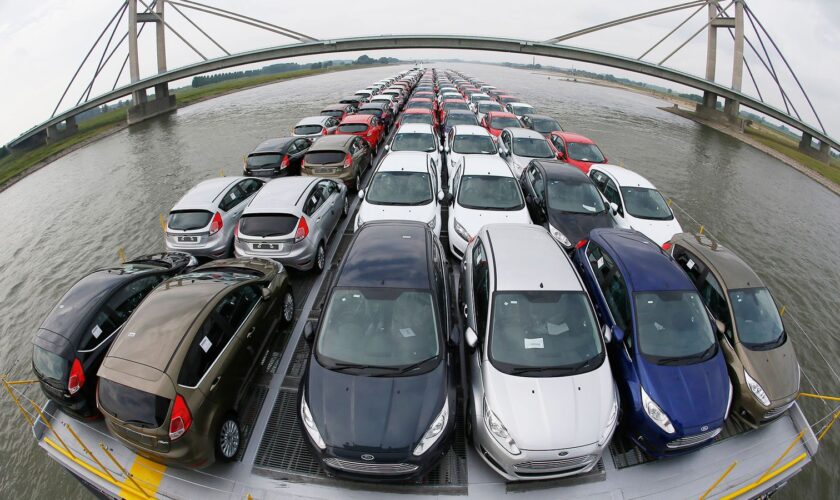 Newly manufactured Ford Fiesta cars are seen on the deck of the car transport ship "Tossa" as it travels along the Rhine, from a Ford plant in the German city of Cologne to the Dutch seaport of Vlissingen, close to Nimwegen in the Netherlands September 13, 2013. A surge in UK auto sales and an extra working day boosted Europe's new car market in September, providing fresh evidence that demand is slowly bottoming out after plumbing lows not seen in over 20 years. Automotive industry association ACEA said on Wednesday that new car registrations in Europe climbed 5.5 percent to 1.19 million vehicles in September, only the third month a gain was recorded in the past two years. Picture taken September 13, 2013. REUTERS/Wolfgang Rattay (GERMANY - Tags: BUSINESS INDUSTRIAL TRANSPORT MARITIME) ..ATTENTION EDITORS: PICTURE 10 OF 17 FOR PACKAGE  'FORD - A JOURNEY DOWN THE RHINE' .SEARCH 'FORD RHINE' FOR ALL IMAGES