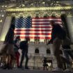 People pass the New York Stock Exchange in New York's Financial District on Tuesday, Nov. 5, 2024. (AP Photo/Peter Morgan)