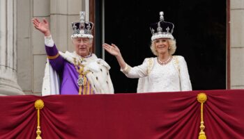 King Charles III and Queen Camilla on the balcony of Buckingham Palace, London, following the coronation. Picture date: Saturday May 6, 2023.