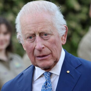 The King looks during his visit to the Australian National Botanic Gardens. Pic: Reuters