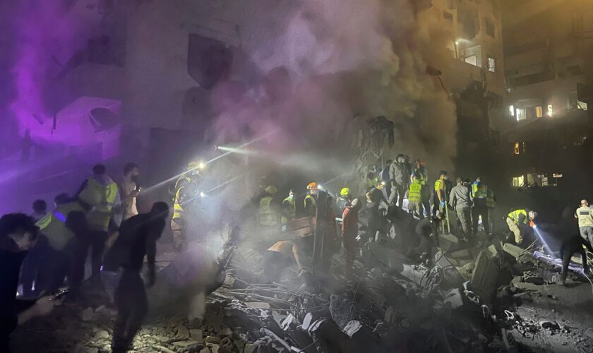 Rescue workers at the site. Pic: AP