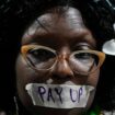 An activist during a demonstration for climate finance at the COP29. Pic: AP