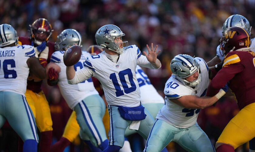 Cowboys score 24 points in 4th quarter for narrow victory over Commanders in bizarre game