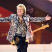 Rod Stewart gestures onstage at the Royal Arena during his "One Last Time" concert in Copenhagen, on Sunday, June 9, 2024. (Torben Christensen/Ritzau Scanpix via AP)