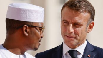 France's President Emmanuel Macron (R) greets Chad's President Mahamat Idriss Deby as he arrives to attend the 19th Summit of the Francophonie at the "Cite internationale de la langue francaise" in the castle of Villers-Cotterets, north-eastern France, on October 4, 2024. French President Emmanuel Macron hosts dozens of leaders of French-speaking countries for a summit he hopes will help boost French influence in a world beset by crises, in particular Africa. The leaders will gather from Ocotber 4 to 5 for the "Francophonie" summit, the first time the event has been held in France for 33 years. (Photo by Ludovic MARIN / AFP)