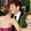 Ariana Grande shows rare PDA with boyfriend Ethan Slater as they hug on red carpet at NYC premiere of Wicked