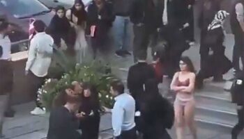 Brave student strips off in Iran to protest strict dress code and is 'violently arrested'