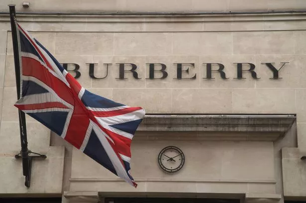 Burberry unveils £40m cost-cutting plan as it swings to £53m half-year loss