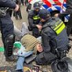 Chaos in Amsterdam as pro-Palestine protesters clash with Dutch police after officers move in on 'illegal' demonstration in aftermath of attacks on Israeli football fans