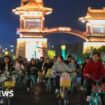 China roads blocked by thousands of cyclists in night quest for dumplings