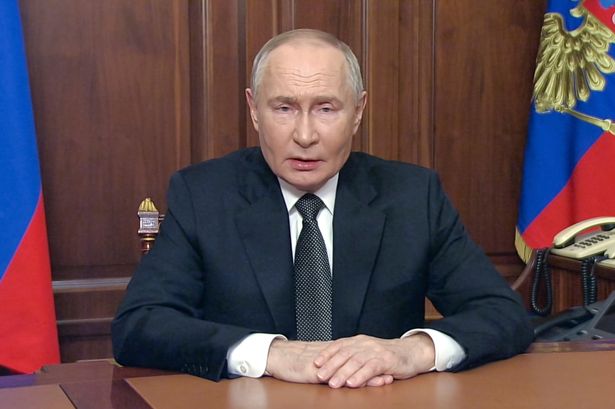 Creepy footage shows Vladimir Putin's hands appear to FREEZE for almost ten minutes