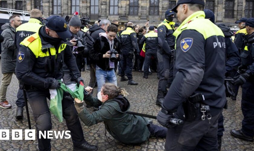 Dozens detained after protesters defy ban in Amsterdam