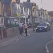 Horror moment driver smashes into pedestrian and hurls him 20ft over garden wall before brawl