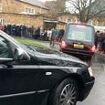 Hundreds of mourners turn out for funeral of rioter Peter Lynch after he killed himself in jail cell while serving two year jail term over asylum seeker hotel protest