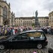 Janey's 'final tour': Mourners pack out Edinburgh's Royal Mile to bid farewell to comedian Jane Godley after her death aged 63