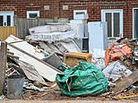 Man who turned front garden into a makeshift tip with tonnes of rubbish is KICKED OUT of his home by council after neighbour complained it made their children sick