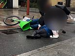 Moment Lime bike rider ploughs into child at 'floating' bus stop - as campaigners call for 'dangerous' crossings to be axed