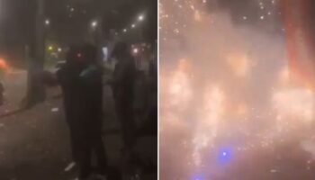 Moment man almost blows himself up after lighting firework in bare hand