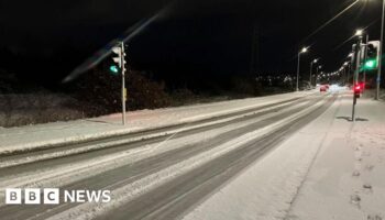 Overnight snowfall shuts schools and hits travel