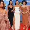 Rita Ora wows in a dusty pink feathered gown as she joins leggy Maya Jama, Vick Hope and Raye on the star-studded MTV EMAs red carpet in Manchester