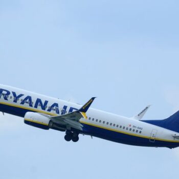 Rowdy Ryanair passengers flying on holiday arrested after 'urinating in plane aisle'