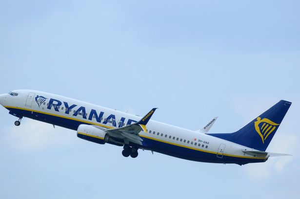 Rowdy Ryanair passengers flying on holiday arrested after 'urinating in plane aisle'