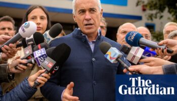 Shock in Romania as hard-right Nato critic Calin Georgescu takes lead in presidential election